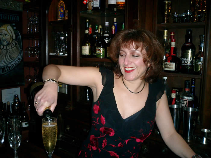 Trisha pouring up some Bubbly on New Years Eve