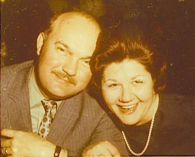 Tess and Mitchell Krach at a dinner party