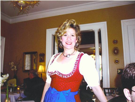 Lisa Krach, proprietress in her Austrian red dirndl