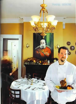 Chef Jonathan Krach holds a House Specialty - Kalbshaxen